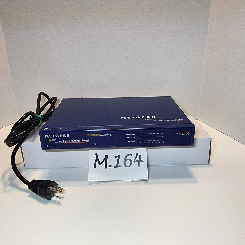 M.164- NETGEAR Fast Ethernet Switch, FS308, powers up/but untested